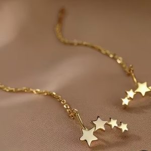 Arete de estrellitas y colgante